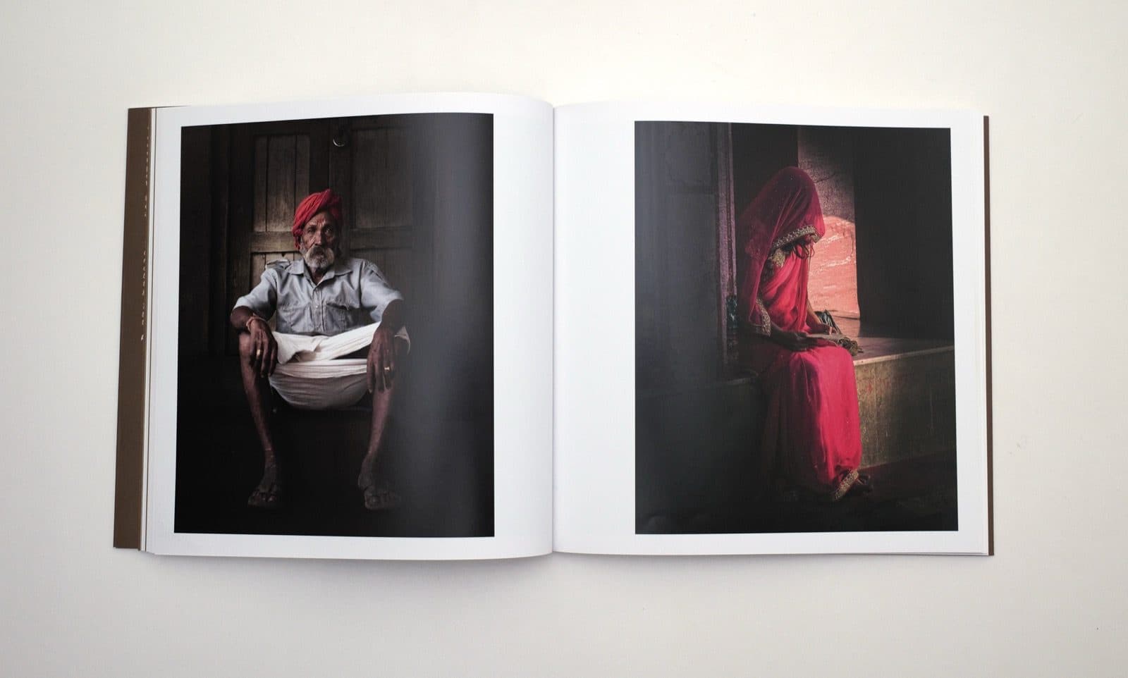 Interior spread from The Human Encounter showing documentary portraits by Carlo Marrazza