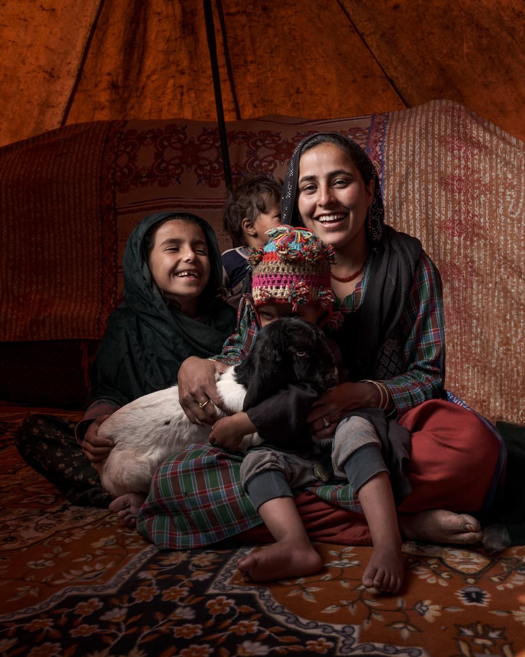 Mother and children inside a tent, Bakkarwal community