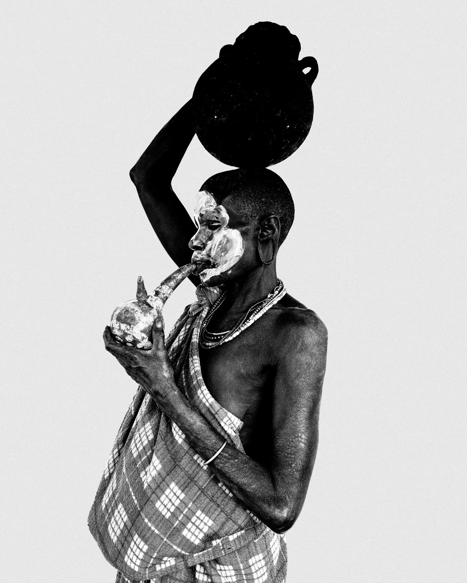 Woman, Suri community