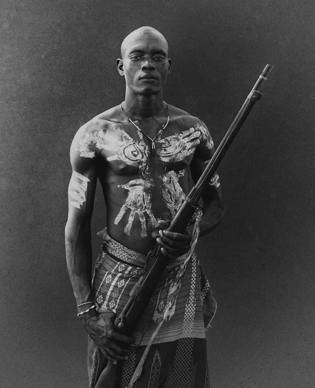 Man with body paint, Karo community